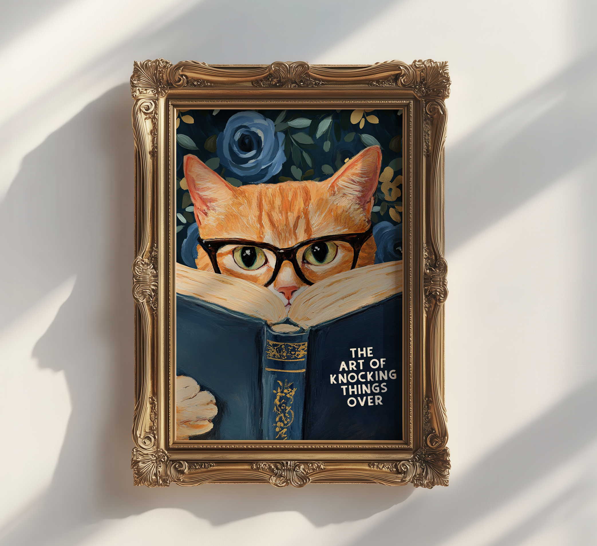 Funny Orange Cat Reading The Art of Knocking Things Over Blue Floral Print Bathroom Wall Art